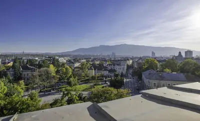 a view of a city with mountains in the background at Best Views from Top Central Cozy 1-Bedroom Flat by Flat Mаnager in Sofia
