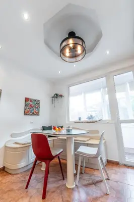 a dining room with a table and two chairs at Spacious 3-BR Central Retreat in Sofia