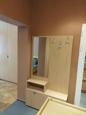 a dressing room with a mirror and a cabinet at The Cathedral in Sofia
