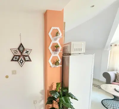 a kitchen with a refrigerator in a room at Central 2 Bedroom Apartments The Quiet Luxury 8 in Plovdiv