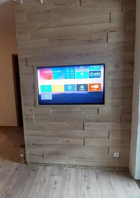 a flat screen tv mounted on a wall at 