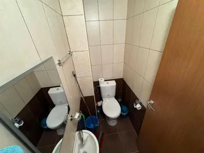 a bathroom with a toilet and a sink at 