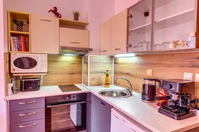 a kitchen with a sink and a microwave at Relaxing Mountain Getaway in Cozy Studio by Flat Mаnager in Pamporovo