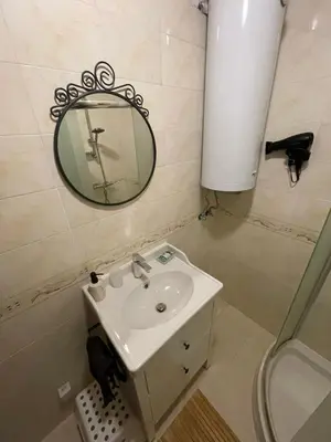 a bathroom with a sink and a mirror at Castle Studio 203 Pamporovo in Pamporovo