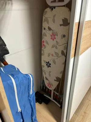 a room with a suitcase and a bed in a room at Turquoise City Exotic Bliss in Sofia