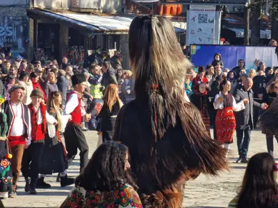 a crowd of people walking down a street at Two-bedroom Apartment Paskalina, near the Ski lift in Bansko