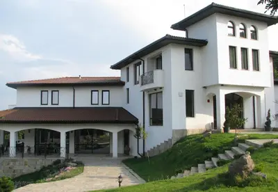a large white house with a yard at Вила Белисима, Villa Bellissima in Kara Agach