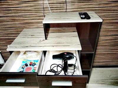 a table with a remote control sitting on top of it at Апартамент за гости в Пампорово in Pamporovo