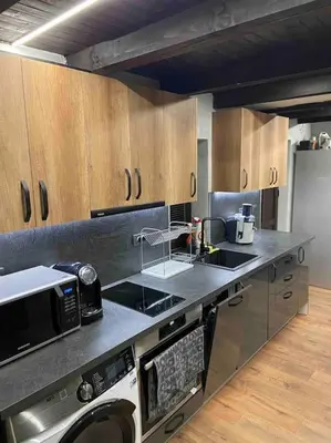 a kitchen with a sink and a microwave at Forest Hill in Troyan