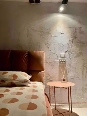 a room with a couch and a table with a lamp at Forest Hill in Troyan