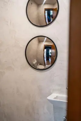 two mirrors on the wall of a bathroom with a sink at Host2U New Inn 2 BD, Fireplace, Free parking in Bansko