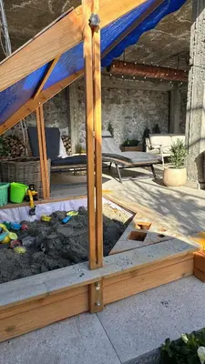 a tent is being built in a yard at Stylish Two Bedroom Family Villa in Sopot