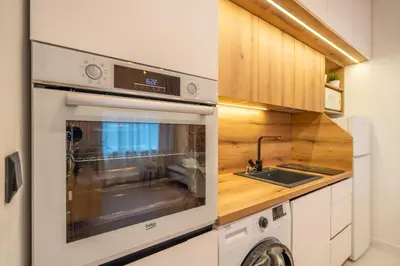 a kitchen with an oven and a sink at Nova Nook in Sofia