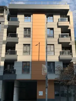 a tall building with balconies on the side of it at Green Paradise - Luxurious Apartments in Plovdiv