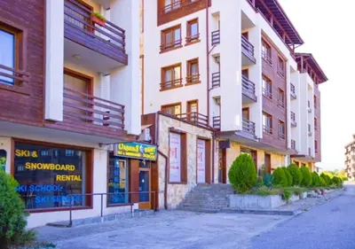 a group of buildings on a city street at Amber - Mountain Escape with free Bottle of good Wine in Bansko