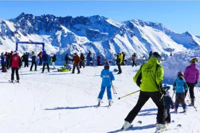 a group of people skiing on a snow covered mountain at 2 Bdr Garden Apt with Spa near Ski and Golf in Razlog