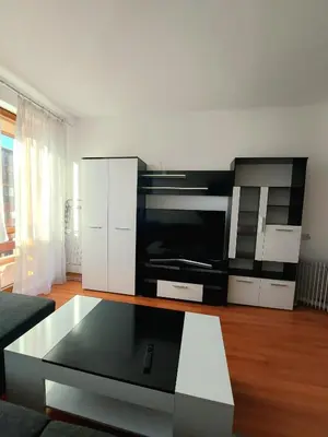 a living room with a couch and a coffee table at BELVEDERE Holiday Club VIP 59 in Bansko