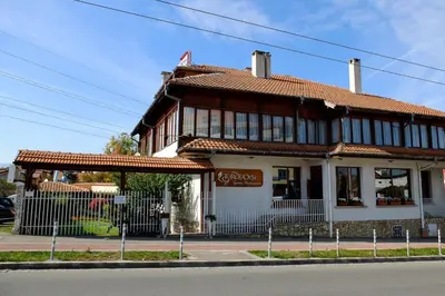 a building on the side of a street at The Mirror Apartment in Sofia
