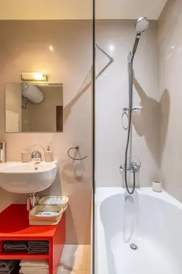 a bathroom with a sink and a shower at iLonka's Home 1 BDR with Workspace and Terrace in Sofia