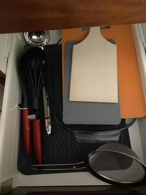 a drawer with utensils in the back of a car at Ski Lift - NoVi Apartments Bansko in Bansko