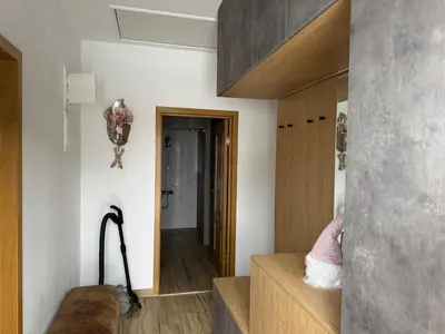 a room with stairs and a hallway with a door at Апартамент с двор Дива in Samokov