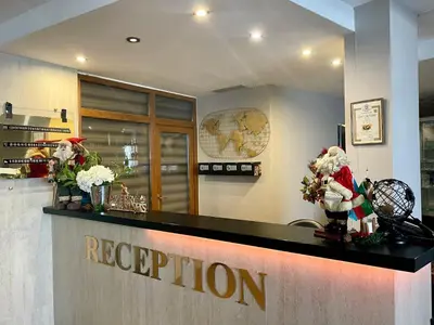 a restaurant with a reception counter with santa decorations at Mountain view 1-bedroom apartment few steps from ski piste and Gondola lift in Bansko