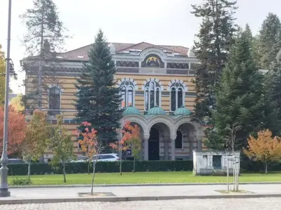 a large building with trees in front of it at The Cathedral in Sofia