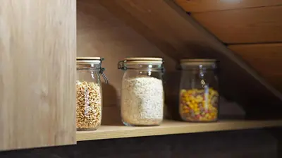 three jars of food are sitting on a shelf at Rich House Velingrad in Velingrad