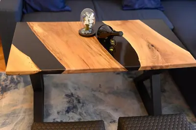 a wooden table with a lamp on top of it at Cozy 2BDR & Peaceful Location & Free Street Parking in Blagoevgrad