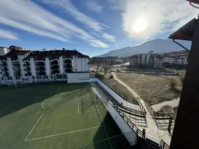 a tennis court on top of a building at Elegant Apartment Ski Access Premium Spa in Bansko