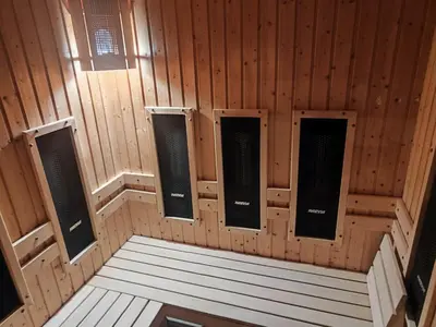 a room with four speakers in a wooden wall at Aspen Resort Studio I306 in Razlog