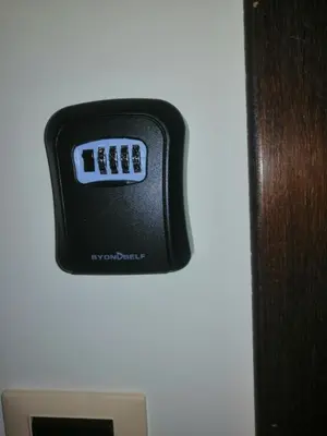 a remote control on a wall next to a door at Apartment Wintermärchen Bansko in Bansko