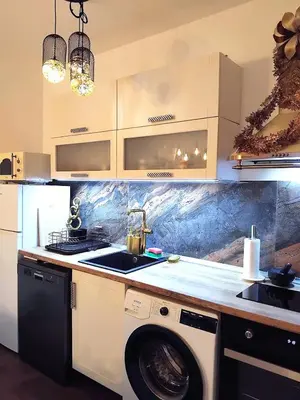 a kitchen with a washing machine and a sink at Art Apart - Top Center in Sofia