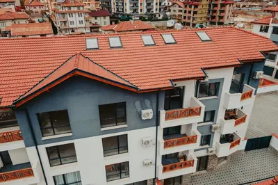 an overhead view of a building with an orange roof at Apartment Aria 3 in Velingrad