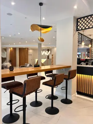 a kitchen with a large wooden table and chairs at Designer apartment at Pirin Sense in Bansko