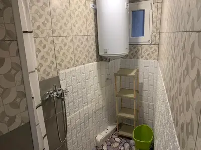a small bathroom with a shower and a toilet at Southern Hill in Sofia