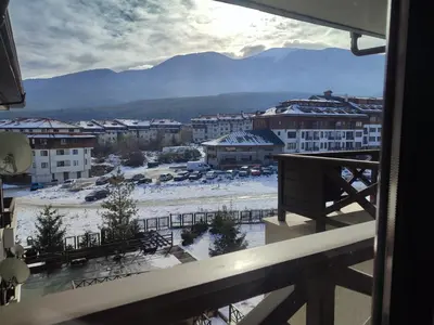 a view from a balcony of a city with snow at Aspen Apartment A409 3OOm from Gondola in Bansko