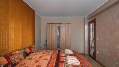 a bedroom with a bed in a room at Penthouse Astralis - Pamporovo in Pamporovo