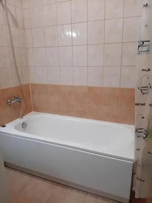 a white bath tub in a bathroom at STUDIO B&K in FLORA BOROVETS in Borovets
