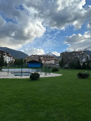 a park with a playground in the middle of a field at MonarX Suites 1113 in Bansko