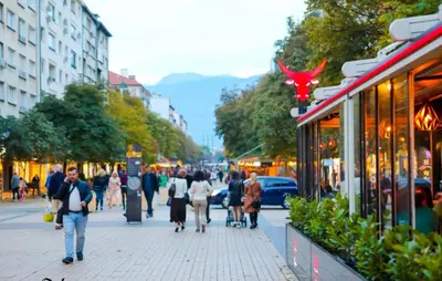 a group of people walking down a city street at Apartment Sofia top center in Sofia