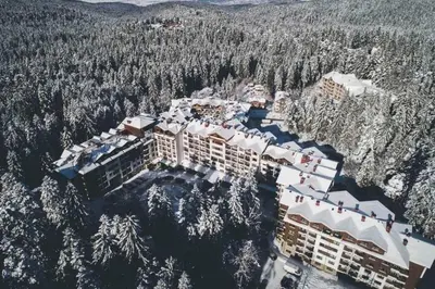 an aerial view of a resort in the snow at Luxuriously furnished and cozy studio - Magnolia in Borovets