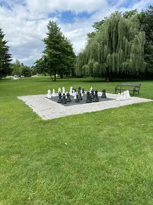 a chess game in the middle of a park at Pravets Lake Home away from home in Pravets