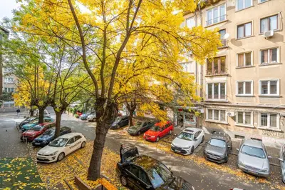 a group of cars parked in a parking lot at 2 bedroom Urban retreat in Sofia
