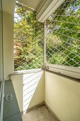 an empty room with a window with a fence at 2 bedroom Urban retreat in Sofia