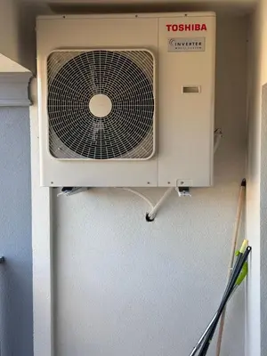 a fan in the corner of a room at PanOrama Luxury Apartments in Panagyurishte