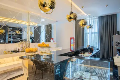 a kitchen with a counter with fruits in baskets at Capital City Center Apart Residence in Plovdiv