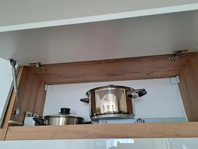 a large pot sitting on top of a kitchen counter at Sunny Mountain View apartment in Razlog