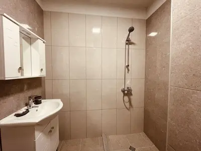 a bathroom with a shower and a sink at Apart2bedroomslux in Sofia