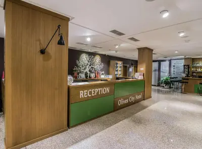 a reception area of a library with a reception counter at Best Western Plus Olives City Hotel - Free Pool & Parking in Sofia